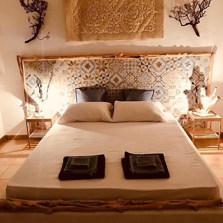 I Ginepri Bed & Breakfast Teulada Bagian luar foto