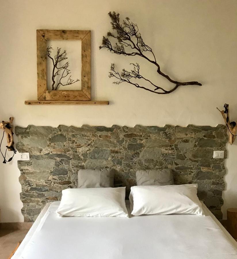 I Ginepri Bed & Breakfast Teulada Bagian luar foto