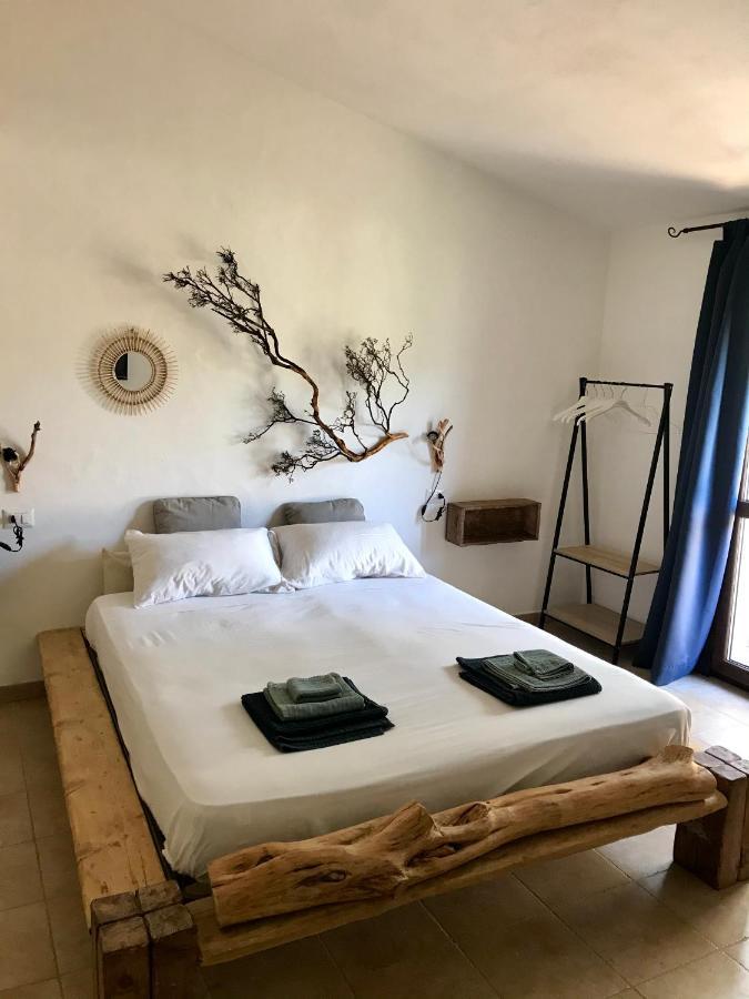 I Ginepri Bed & Breakfast Teulada Bagian luar foto