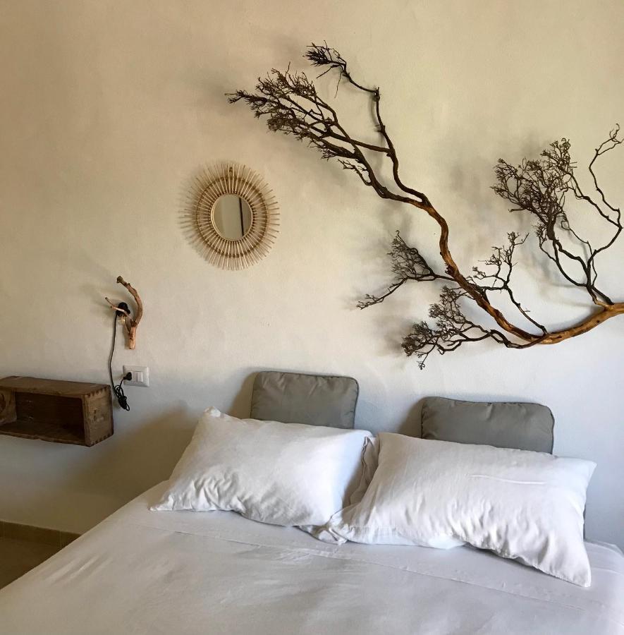 I Ginepri Bed & Breakfast Teulada Bagian luar foto