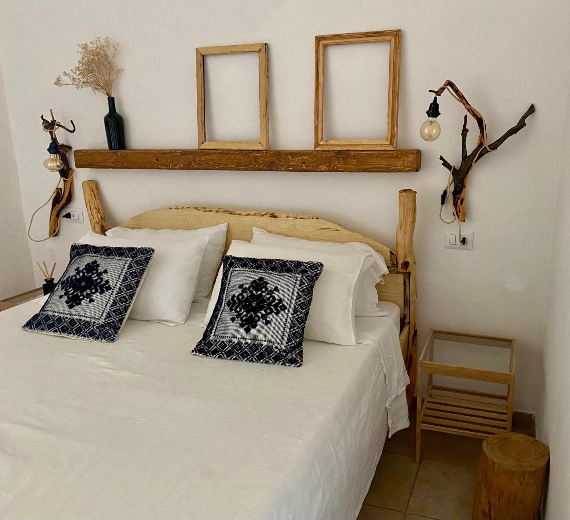 I Ginepri Bed & Breakfast Teulada Bagian luar foto